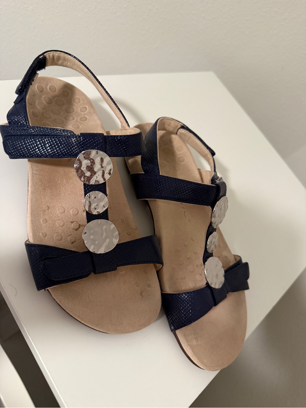 Vionic Navy Leather T-Strap Sandals with Hammered Silver Discs